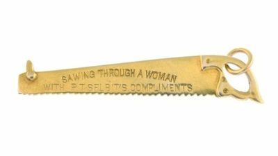 Gold Charm Given To Volunteer Who Was ‘Sawn In Two’ In Famous Magic Trick Sold For $2k