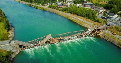 Huge wood and steel bridge in 'catastrophic' collapse as drivers miraculously survive