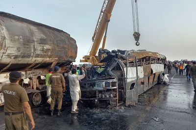 At least 20 killed in Pakistan as bus-tanker crash causes fire