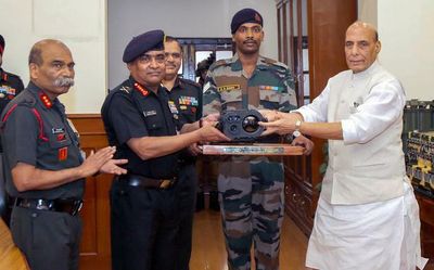 Defence Minister Rajnath Singh hands over several indigenous defence equipment to Indian Army