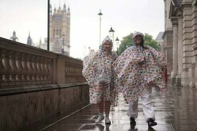 Weather latest: Londoners rejoice as overdue rain finally falls on parched ground