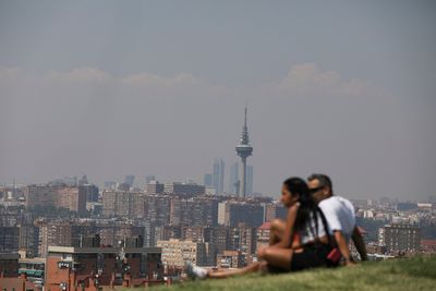Portuguese wildfire envelops Madrid skyscrapers in smoke 400 km away