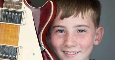 12-year-old boy sent signed gift from Mark Knopfler after giving away all of his busking money