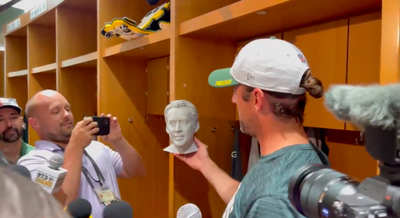 Someone sent Aaron Rodgers a Nicolas Cage bust and of course it’s in his locker now