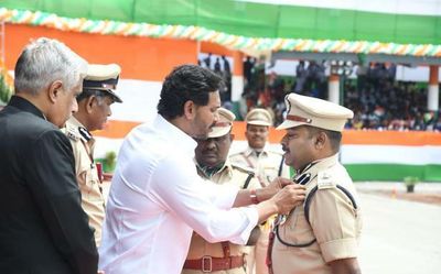 Andhra Pradesh: three fire officers in jubilant mood after receiving medals from Chief Minister