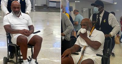 Mike Tyson appears frail as heavyweight legend requires wheelchair at airport