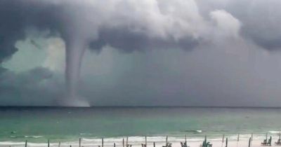 Huge waterspout twister spotted rampaging in sea as dangerous weather phenomenon seen