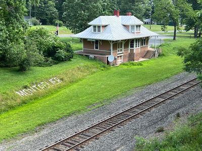 A post office closes over an historic exhibit showing signs for 'White' and 'Colored'