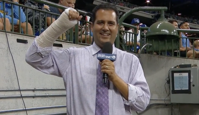 A Dodgers reporter attempted to ride the Brewers’ home run slide and it did not go well