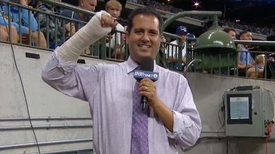 Dodgers Reporter Slides Into an Arm Injury at Brewers Game (Video)