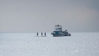 One seriously injured and another missing after falling into Lake Michigan on Wednesday
