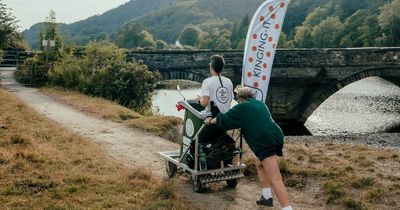 Couple push each other in wheelie bin on 200-mile journey across Wales