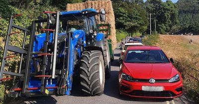 Tractor gets stuck after 50 drivers park on double yellow line at beauty spot