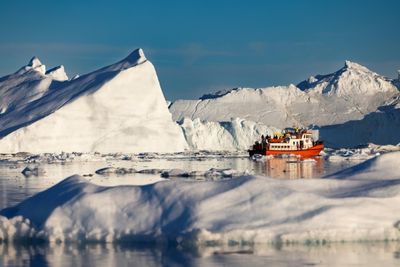 Greenland treads softly on tourism as icebergs melt