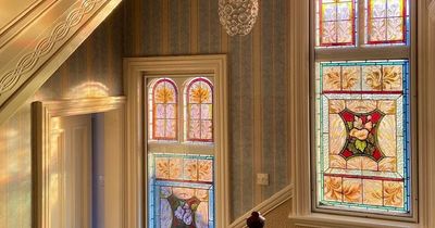 Family uncovers rich past of Victorian home with stunning stained glass hallway