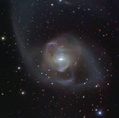 Behold! Telescope image captures a dusty dance from merging galaxies