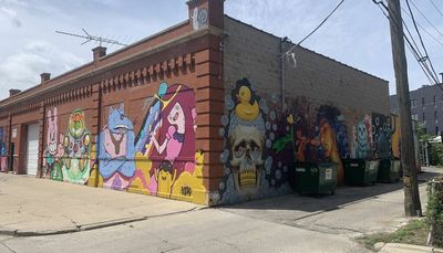 A Chicago businessman saw some artists painting boarded-up buildings. Here’s what came next.