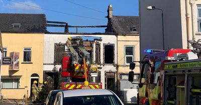 Fire crews and aerial appliance tackle fire at property in Bangor