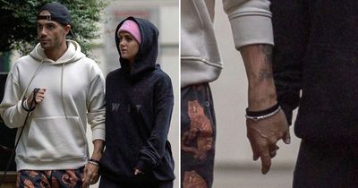 Max George and Maisie Smith hold hands on dog walk after returning from romantic holiday