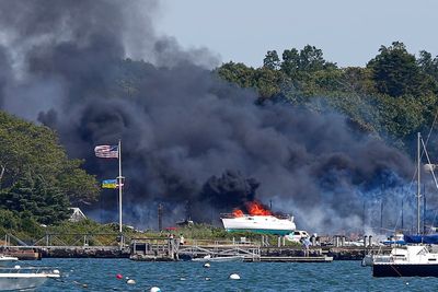 Large fire consumes boats, buildings, vehicles at boatyard