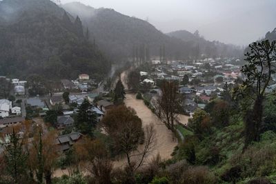 Rains pounding New Zealand ease, more people forced from their homes