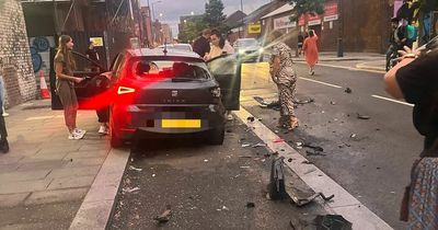 Woman runs out in her pyjamas to help driver caught in hit and run crash