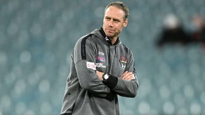 Essendon sacks AFL head coach Ben Rutten with a year remaining on his contract