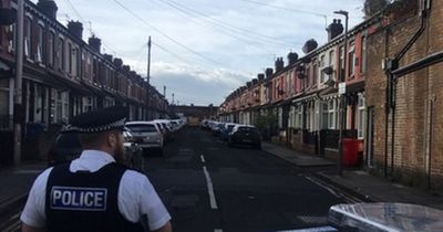 Woman found shot dead in back garden of a house