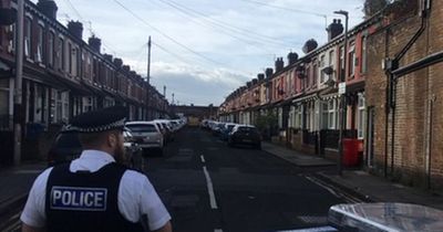 Murder investigation after woman found shot dead in back garden of house