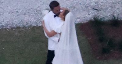 J Lo's breathtaking wedding dress pictured as Ben Affleck weds star in jaw dropping bash