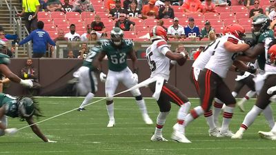 Josh Dobbs scrambles for a first and almost loses his jersey