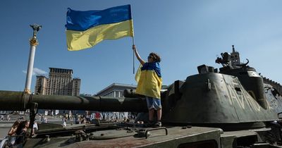 Ukrainian kids play on tanks captured from Russian army vowing ‘we’ll beat Putin’