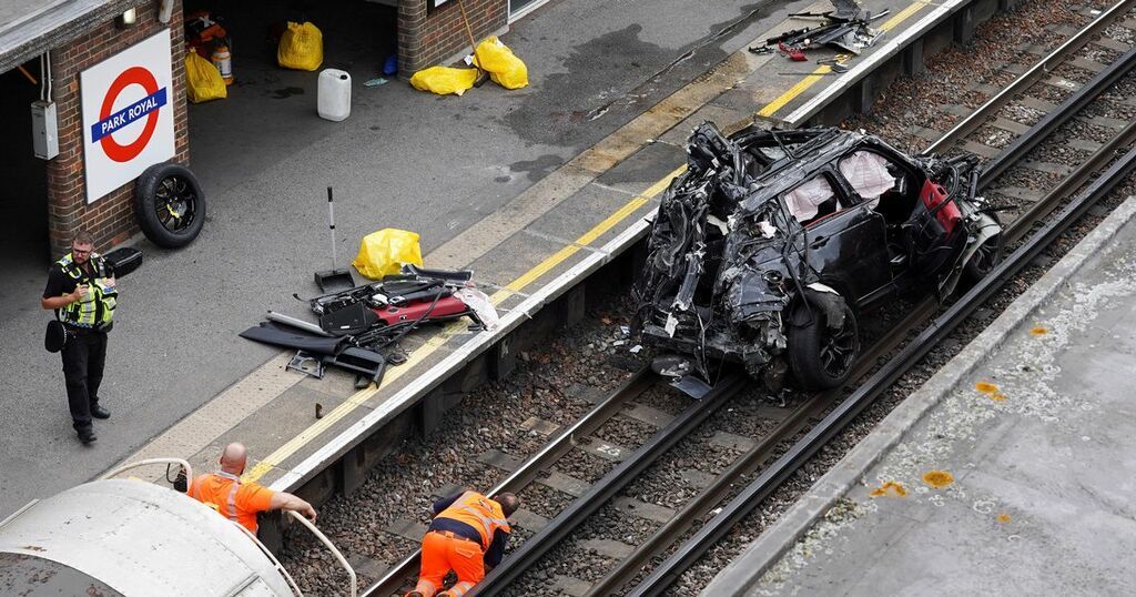 Woman dies as Range Rover plunges onto train track…