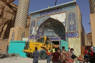 Two more bodies pulled from Iraq shrine after landslide: rescuers