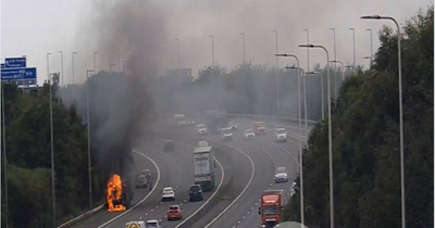 Fire closes Glasgow M74 northbound as emergency services race to the scene