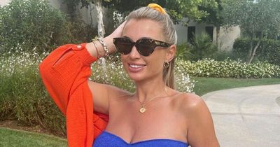 Billie Faiers displays her baby bump in a bikini as she soaks up the sun in Greece