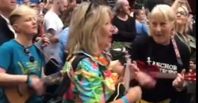 Watch as St George's Market taken over by Ukulele flash mob performing Teenage Kicks
