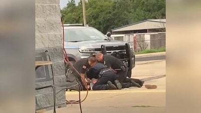 Watch: Arkansas officers suspended after beating a suspect under arrest