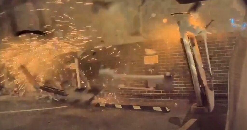 Horrifying Moment Range Rover Crashes Through Tesla