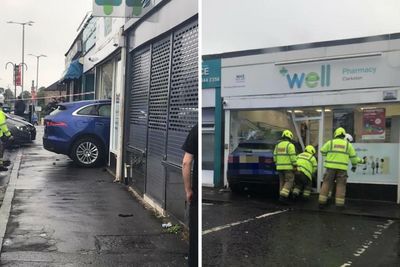 Emergency services on scene as car ploughs into pharmacy