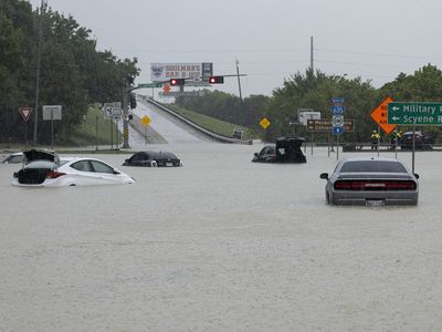 Heavy rain floods streets across the Dallas-Fort Worth area