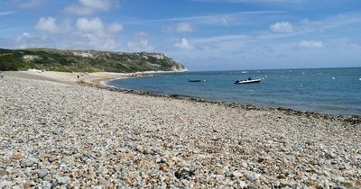 The secluded beach surrounded by dramatic clifftops near Bristol