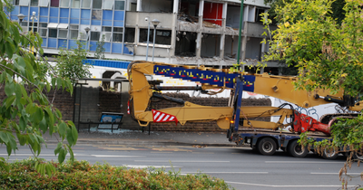 Crane crashes into bus stop on major Nottingham road -leaving shards of glass on the floor