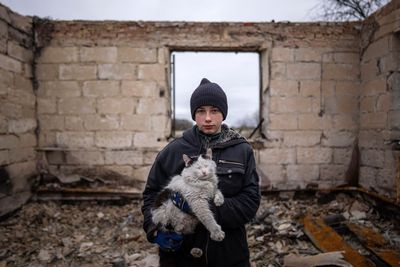 Six months on, Ukraine fights war, faces painful aftermath