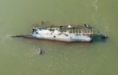 Drought reveals Nazi warship graveyard laden with explosives in the Danube river