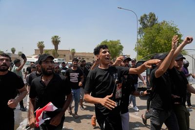 Iraq Shiite cleric's supporters demand assembly be dissolved