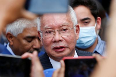 Najib leaves court with police escort after 1MDB conviction upheld