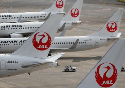 Japan to ease Covid entry requirements, raise cap on entrants