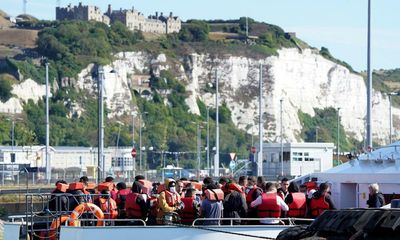 Record 1,295 people in one day cross Channel in small boats