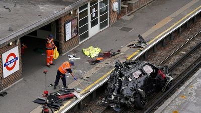 Woman dies after car crashes onto railway track near London's Park Royal underground station